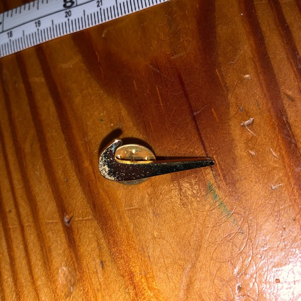 Nike swoosh pin